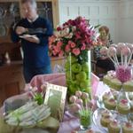 Dessert table with Vanilla Cupcakes with Sugar Flowers, Brownies, Fruit with Caramel Coffee Fondue, and Cakepops.